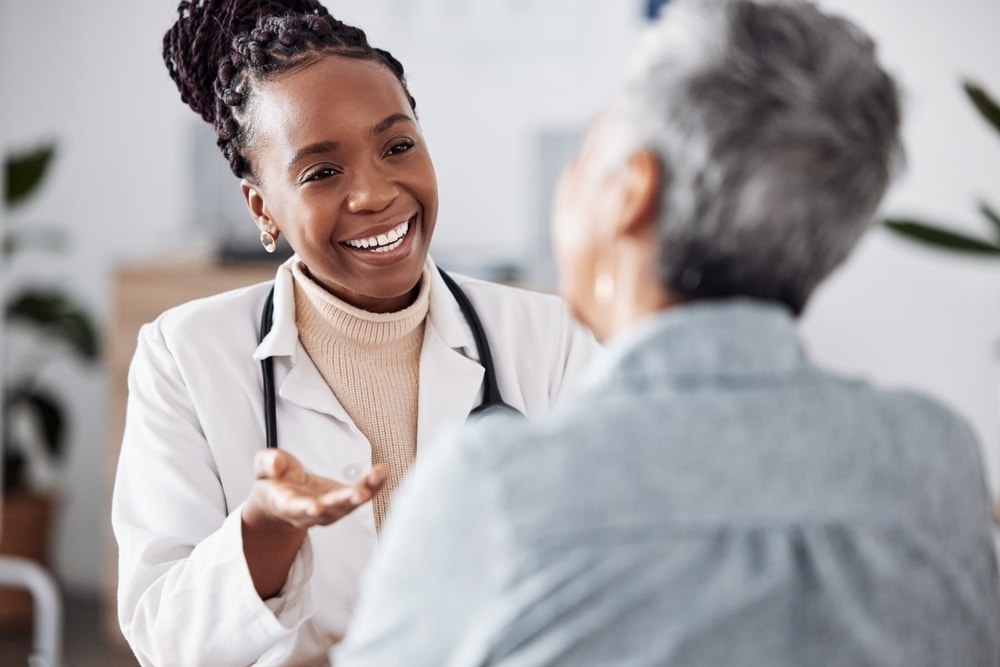 A doctor having a conversation with their patient