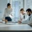 Bad work. Angry female boss holding a meeting with her employees